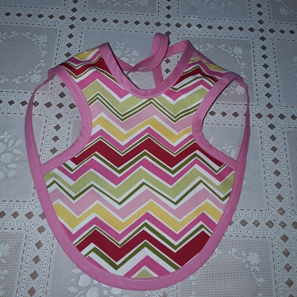 Reversible baby bib for your little baby girl. - Picture 1 of 3